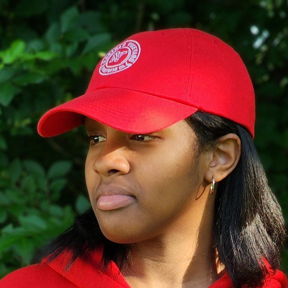 black girl in red cap